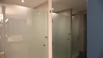 Shower, towels, shampoo, toilet paper