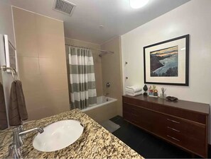 Hair dryer, towels, soap, toilet paper