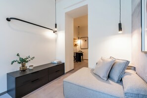 Apartment | Living area | 48-inch flat-screen TV with digital channels - HONEST Karlín (Prague)