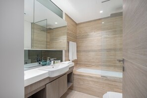Elite Villa | Bathroom | Rainfall showerhead, eco-friendly toiletries, hair dryer, bidet