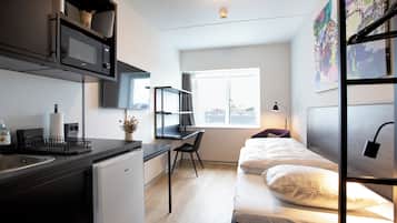 Estudio, 1 cama individual | 1 dormitorio, ropa de cama hipoalergénica, cortinas opacas y wifi gratis
