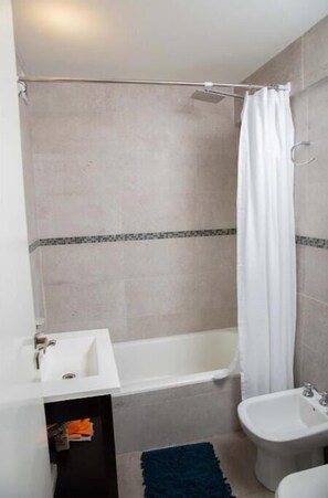 Hair dryer, towels, soap, toilet paper