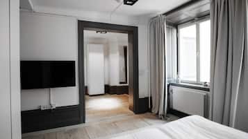 Family Apartment Small | Premium bedding, blackout curtains, iron/ironing board, free WiFi