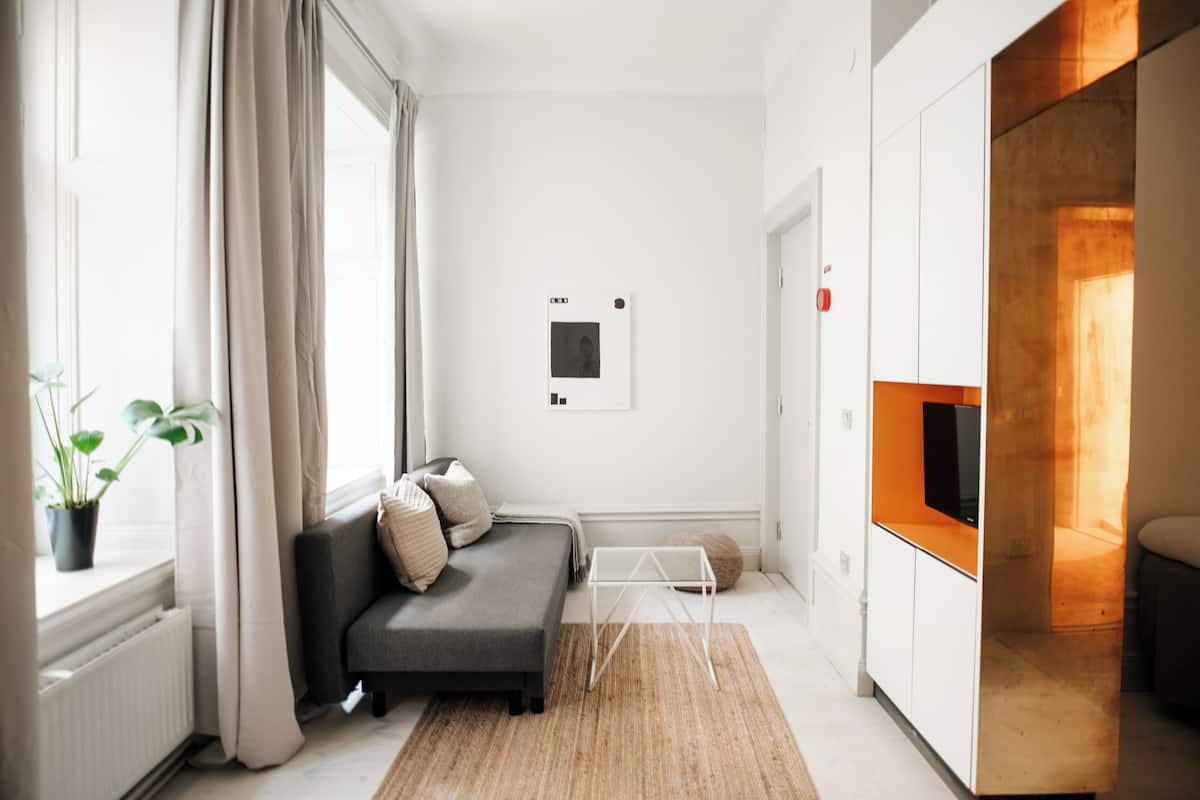 Familienapartment | Wohnbereich | 32-Zoll-Flachbildfernseher mit Kabelempfang