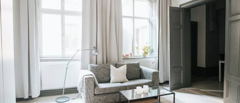 Double Studio Large | Living area | 32-inch flat-screen TV with cable channels