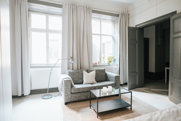 Double Studio Large | Living area | 32-inch flat-screen TV with cable channels