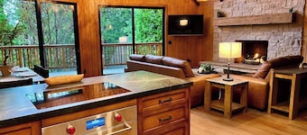 Nestled in the majestic San Bernardino Mountains, this luxurious Lake Arrowhead cabin offers an unforgettable escape into serene alpine beauty.