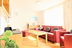 Classic Apartment (Top 1) | Living area | Flat-screen TV - Chalet Schmittenbach (Zell am See)