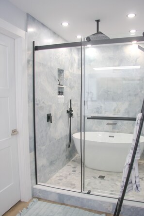 Shower, hair dryer, towels, soap