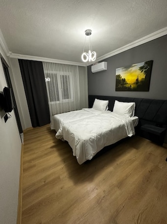 Quarto empresarial | Ferros/tƔbuas de passar roupa, Wi-Fi de cortesia, roupa de cama