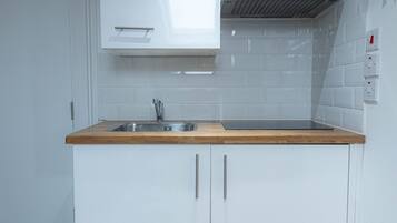 Apartment, 1 Bedroom, Private Bathroom, City View | Private kitchen | Full-sized fridge, microwave, stovetop, coffee/tea maker