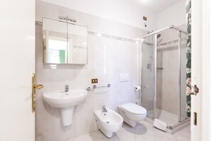 Shower, bidet, toilet paper