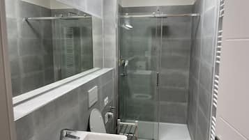 Shower, towels, soap, shampoo