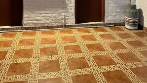 A building with a tiled patio, a window with curtains, and a door. - Cozy Suit!viajeros y Mujeres 100% Seguras!céntrico (Quito)