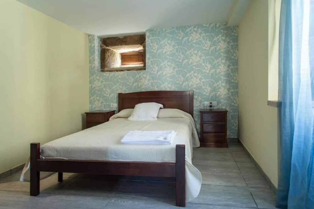 Family Room, Garden View | In-room safe, desk, laptop workspace, iron/ironing board