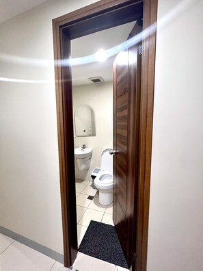 Shower, hair dryer, towels, soap - Quigle's Nook with Fast WiFi & Netflix @ Horizons 101 Condominium  (CITY OF CEBU (Capital))