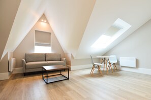 One Bedroom Apartment | Living area | Flat-screen TV, heated floors - Woodview Serviced Apartments by Concept Apartments (London)