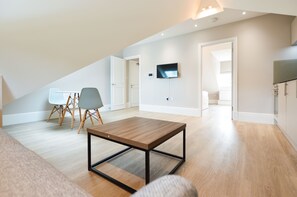 One Bedroom Apartment | Living area | Flat-screen TV, heated floors - Woodview Serviced Apartments by Concept Apartments (London)