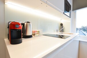 Standard Studio Apartment | Private kitchen | Mini-fridge, microwave, stovetop, electric kettle