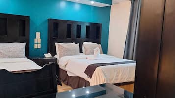Habitación familiar | 2 habitaciones, escritorio, wifi gratis y ropa de cama