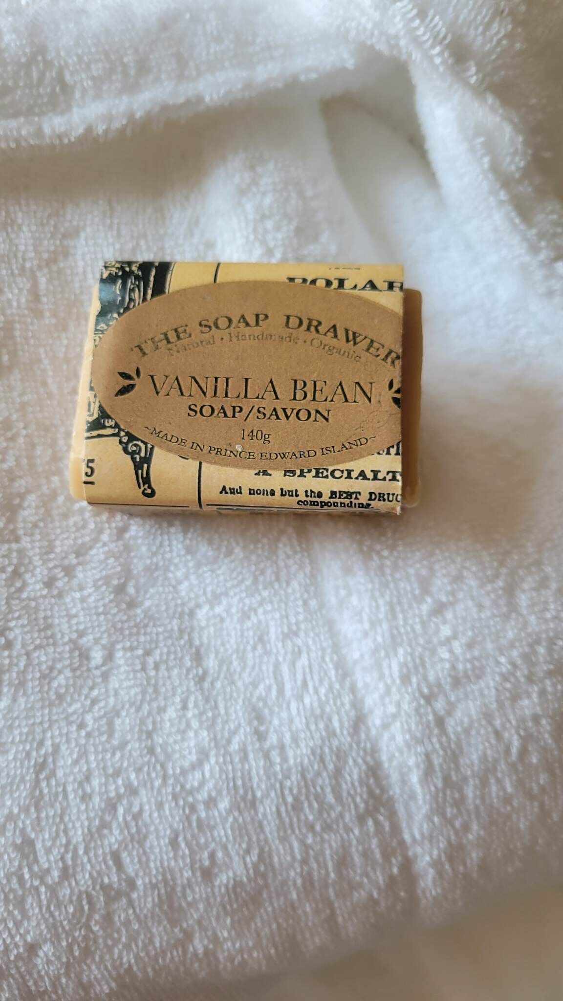 A small bar of vanilla bean soap with a label.