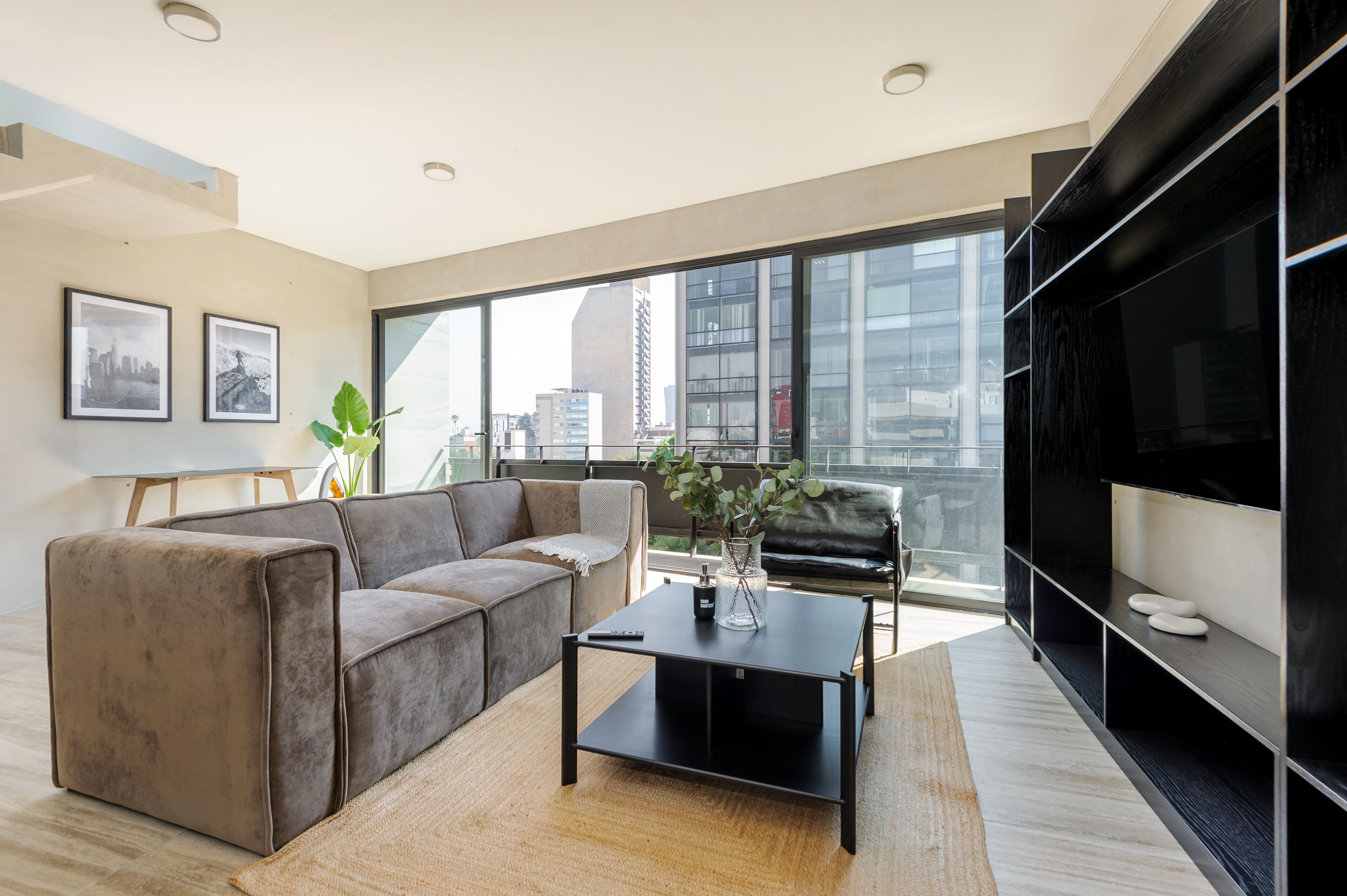 Elite Apartment | Living area | 40-inch Smart TV with cable channels