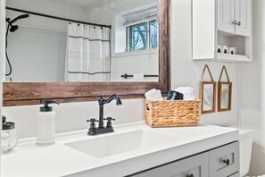 Hair dryer, towels, soap, shampoo