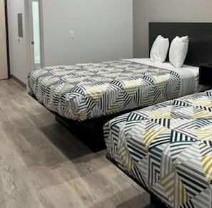 Desk, blackout curtains, free WiFi, bed sheets