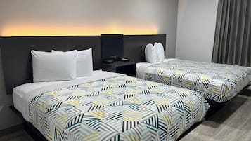 Escritorio, cortinas opacas, wifi gratis y ropa de cama