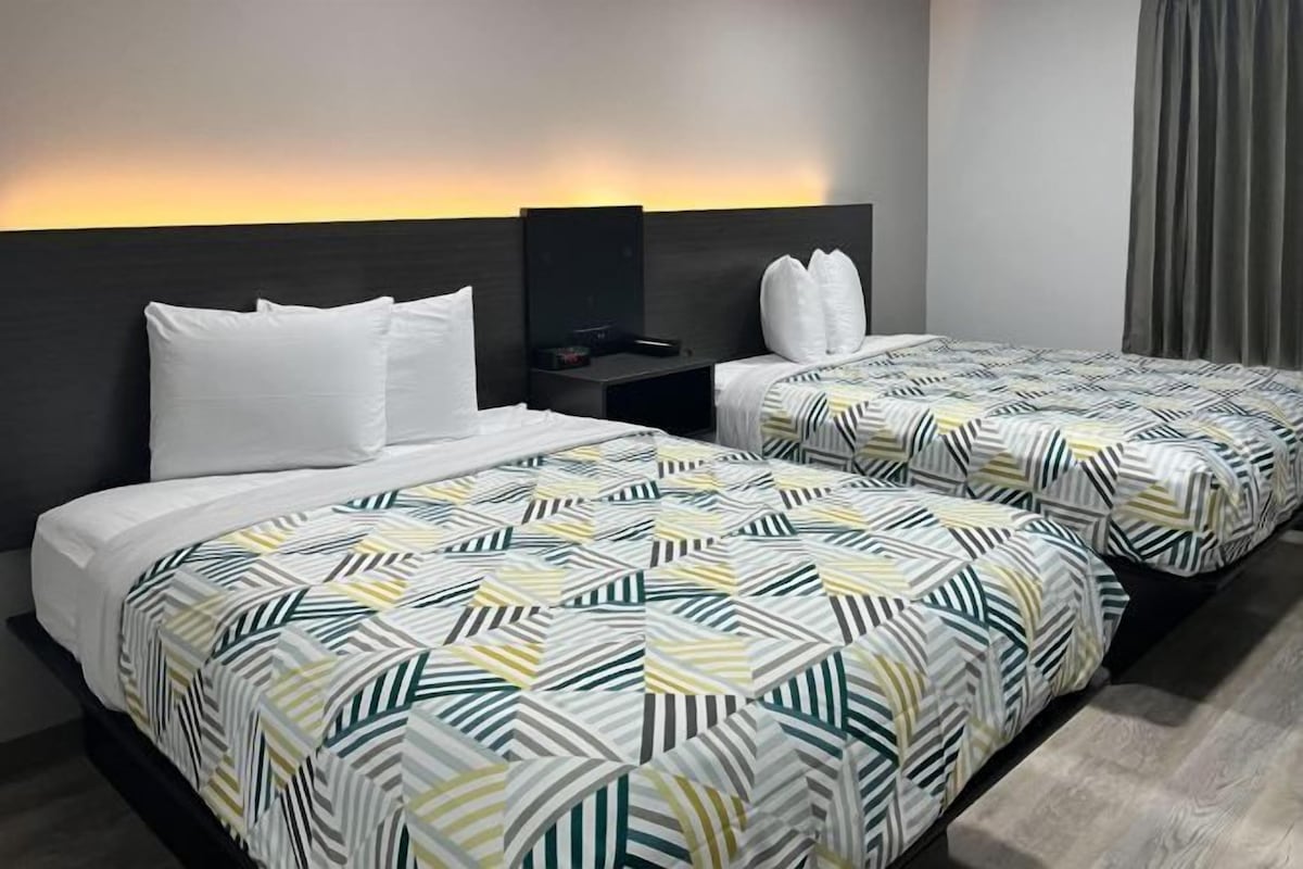 Desk, blackout drapes, WiFi (free), bed sheets
