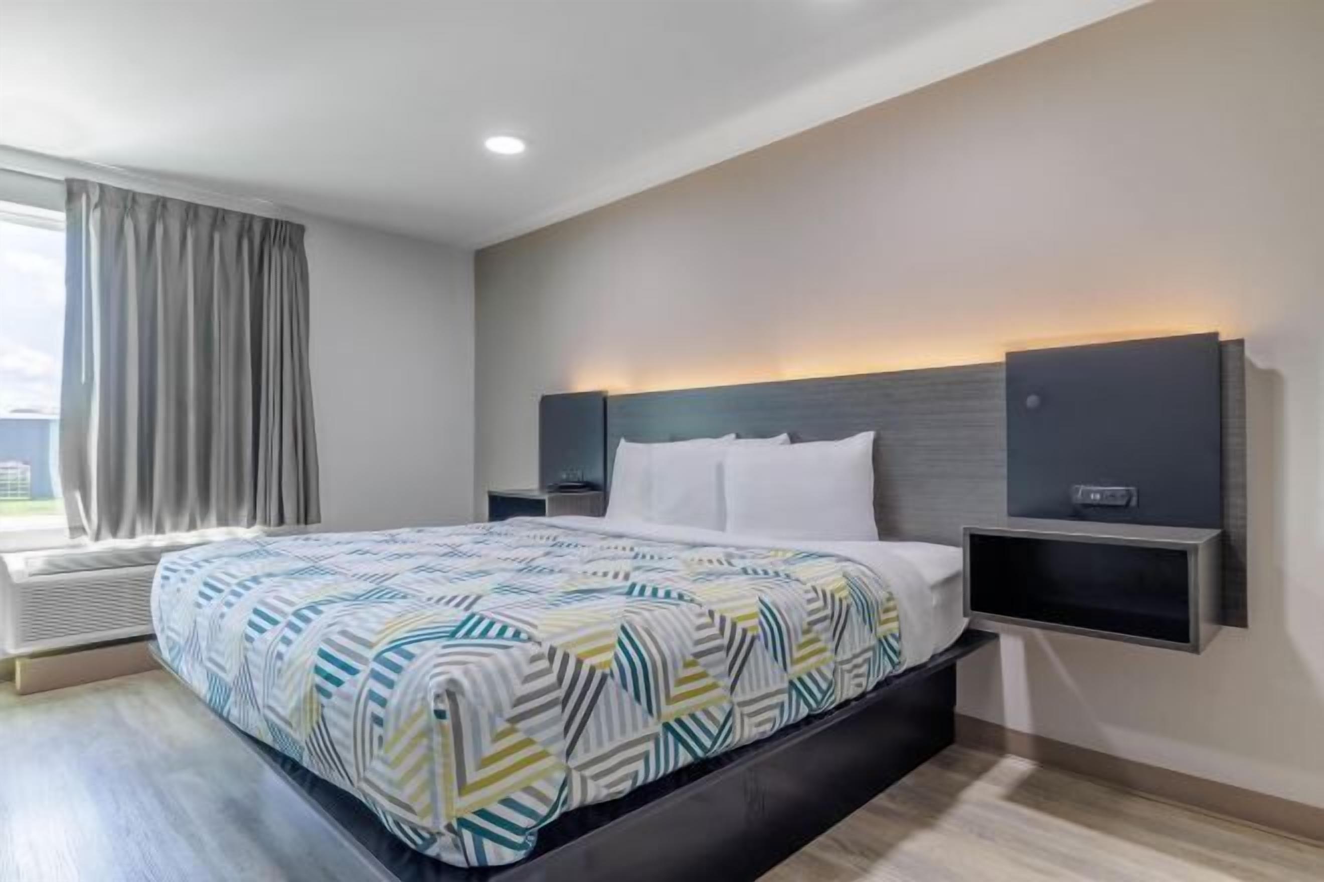 Desk, blackout curtains, free WiFi, bed sheets