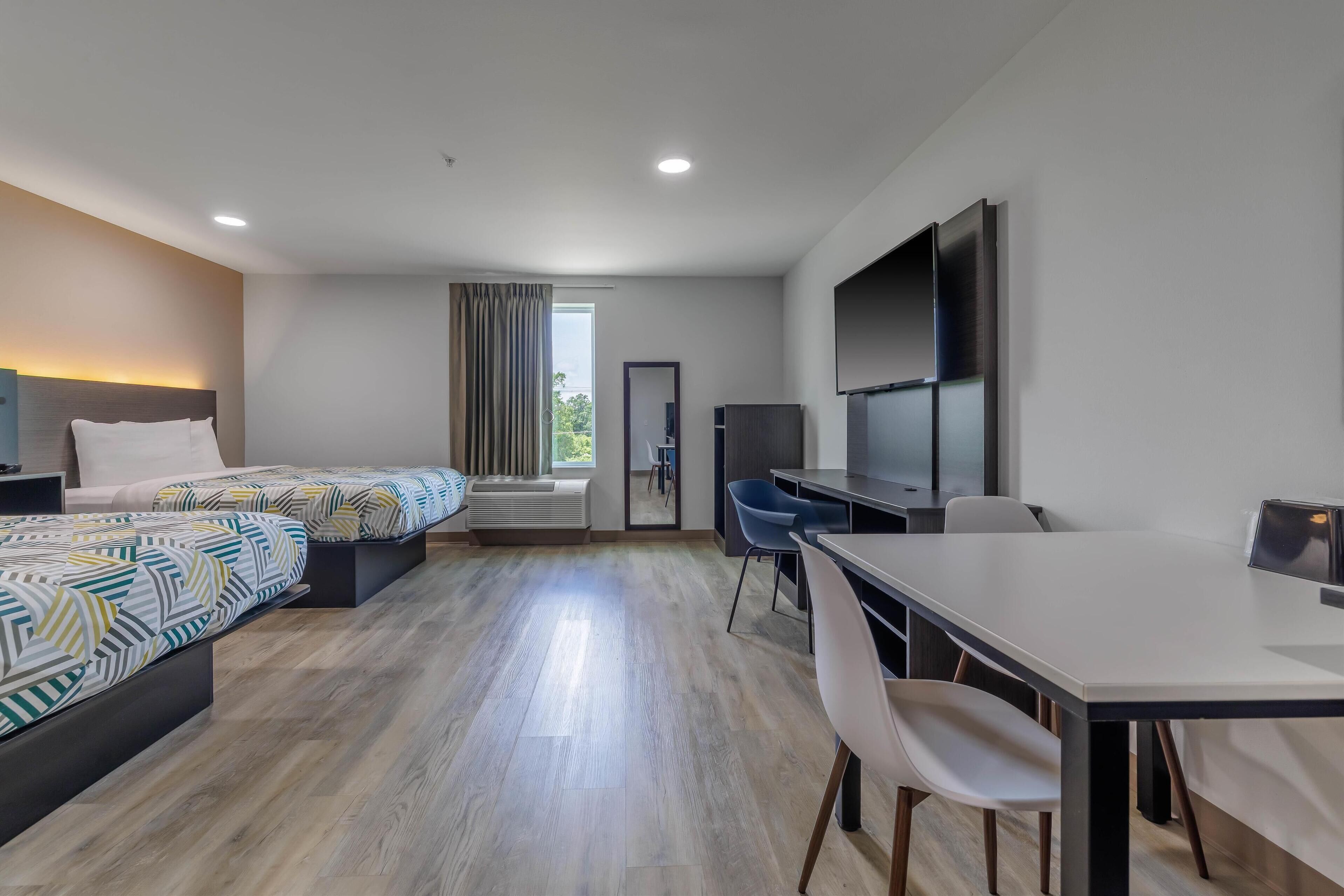 Desk, blackout drapes, free WiFi, bed sheets