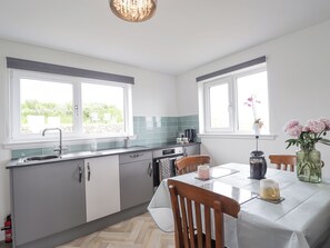Fridge, electric kettle, toaster, cookware/dishes/utensils