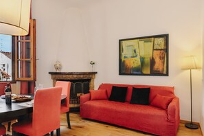 Smart TV, fireplace, books