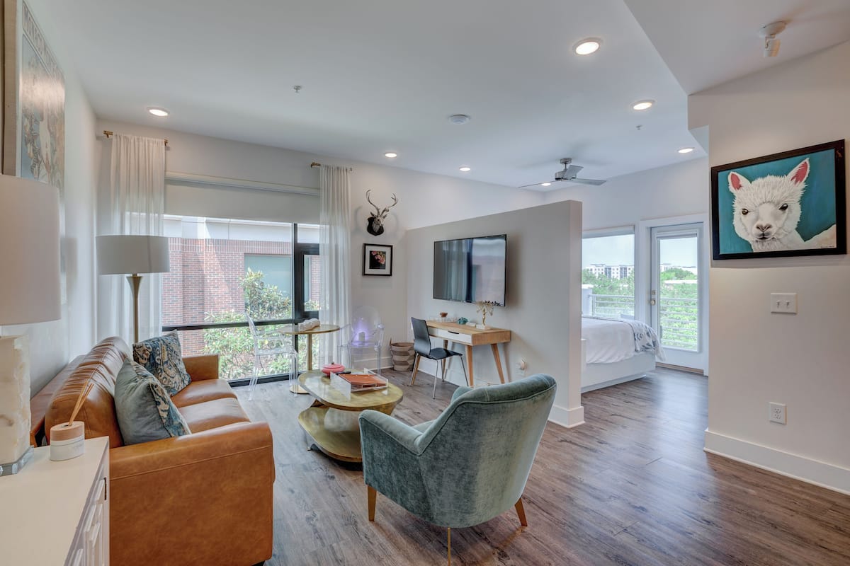 The Hive 202 King w/ Balcony | 1 bedroom, premium bedding, pillowtop beds, individually decorated