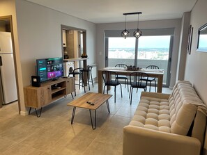 Standard Apartment | Living area | Flat-screen TV, foosball, table tennis - Rent a Flat Río Cuarto (Rio Cuarto)