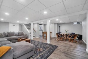 Smart TV, fireplace, foosball, books