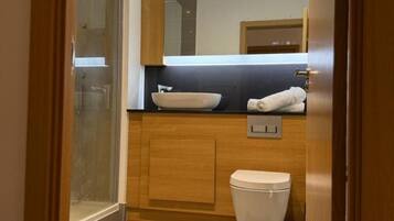 Shower, towels, soap, shampoo