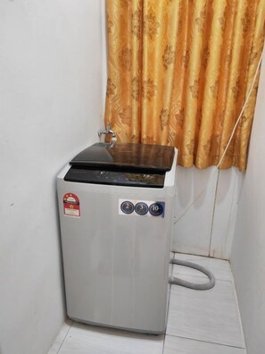 Shower dan handuk