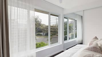 2 bedrooms, desk, iron/ironing board, travel crib