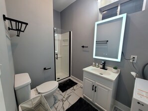 Hair dryer, towels, soap, shampoo