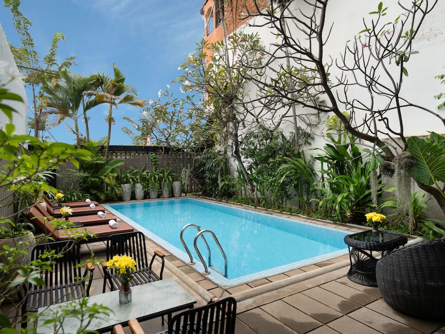Outdoor pool, open 9:00 AM to 9:00 PM, pool loungers