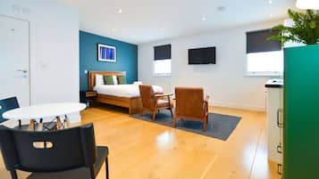 Standard Studio Apartment | Living area | Flat-screen TV, heated floors