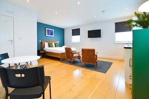 Standard Studio Apartment | Living area | Flat-screen TV, heated floors - The Warehouse at West Hampstead by Concept Apartments (London)