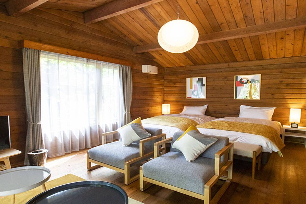 基础小屋, 2 张单人床 | 迷你吧、客房内保险箱、办公桌、遮光窗帘