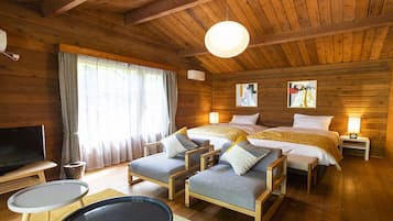 Cabaña básica, 2 camas individuales | Minibar, caja de seguridad en la habitación y escritorio