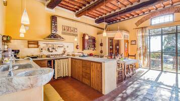 Family House, Multiple Bedrooms, Refrigerator & Microwave (Tuscan Home Rignano Private Garden) | Private kitchen | Fridge, microwave, oven, stovetop