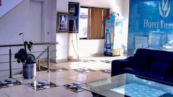 Executive Room | Living area | TV