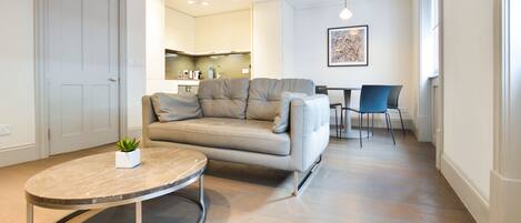 Soho Luxury 1 Bedroom Apartment | Living area | Flat-screen TV, heated floors