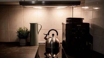 Fridge, microwave, stovetop, coffee/tea maker